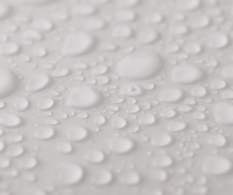 Why Small Ceiling Cracks Form Above Your Shower