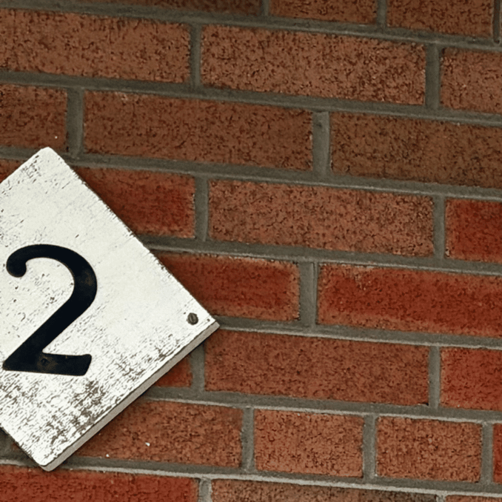 House number area being sanded and prepared for painting