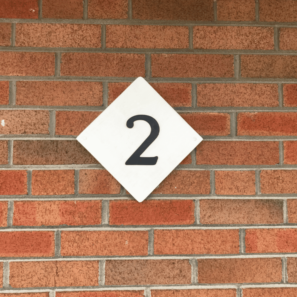 Freshly painted house numbers with clean and visible finish