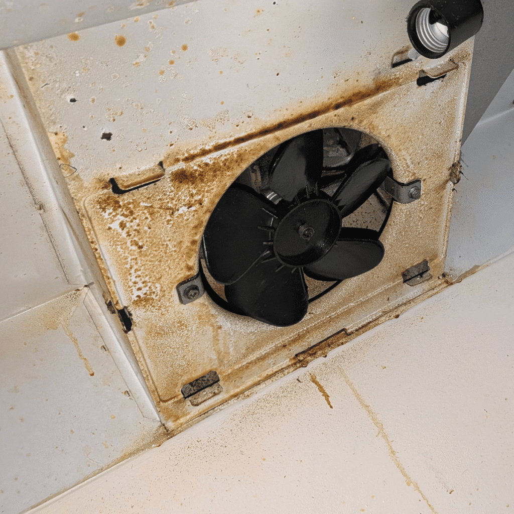 Kitchen exhaust fan being installed for better ventilation