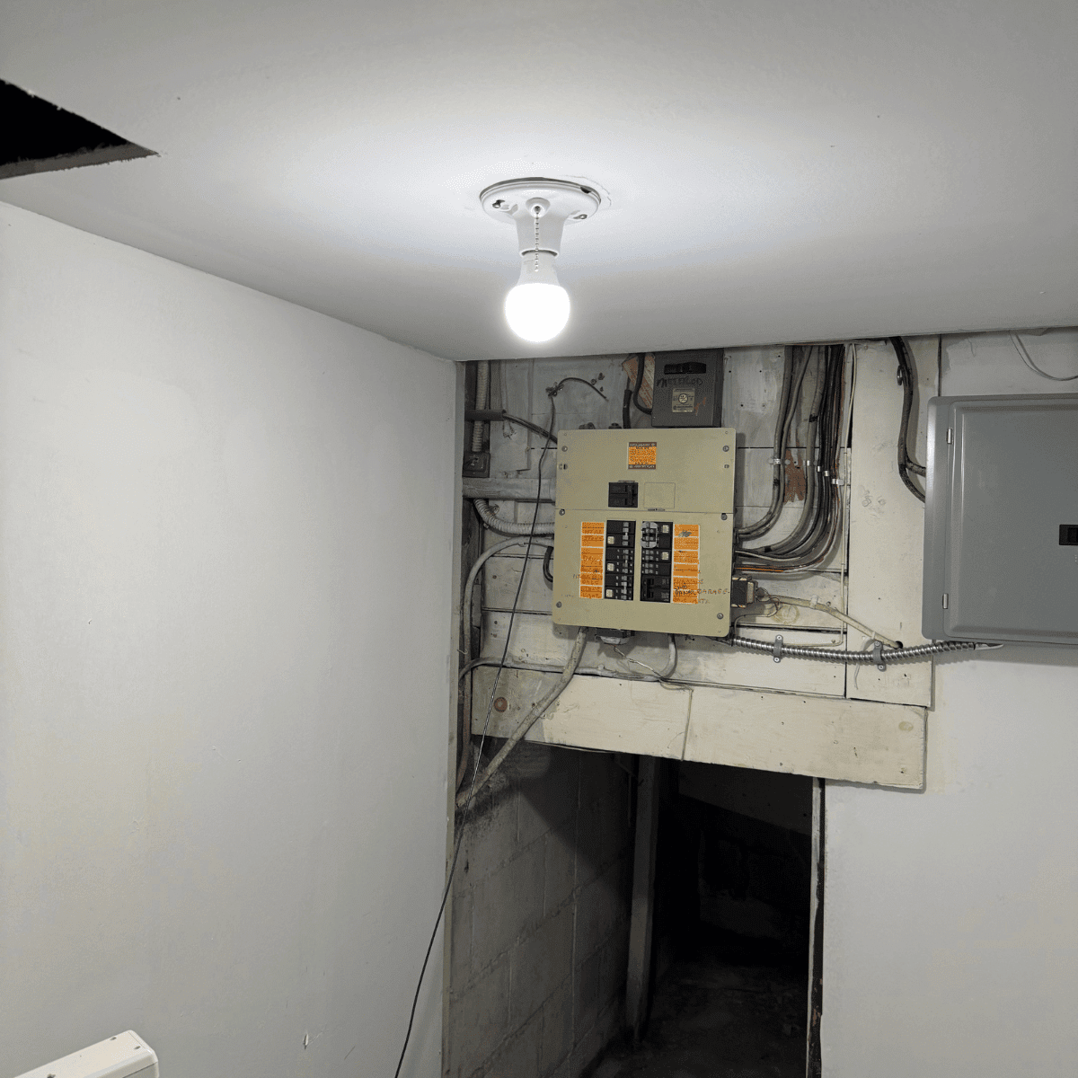 Ceiling light fixture being installed securely