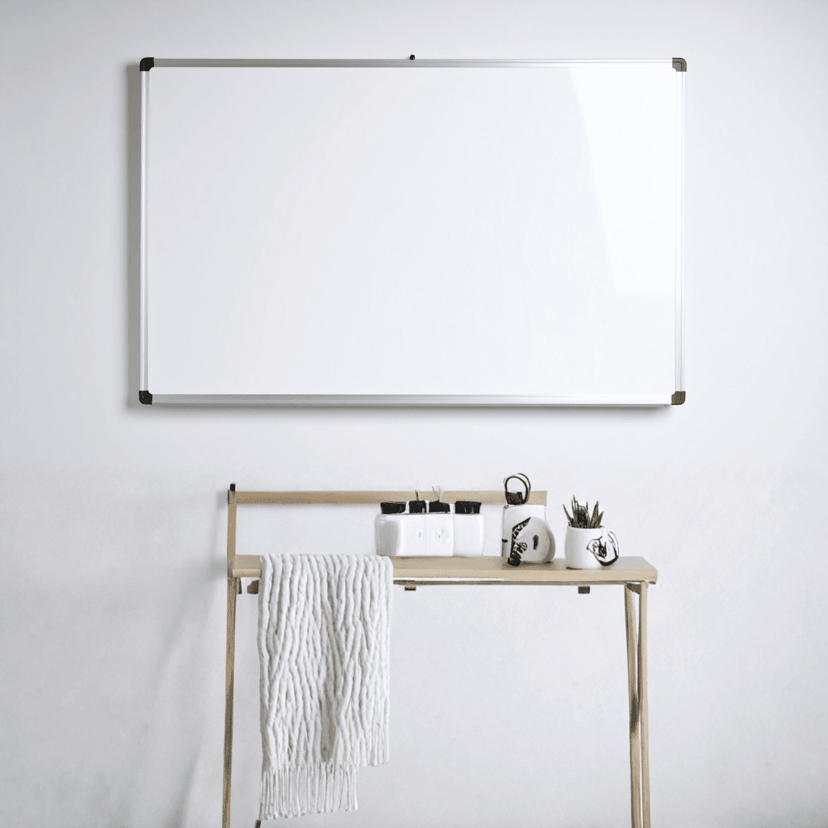 Glass whiteboard installation Toronto – wall-mounted whiteboard installed level in an office
