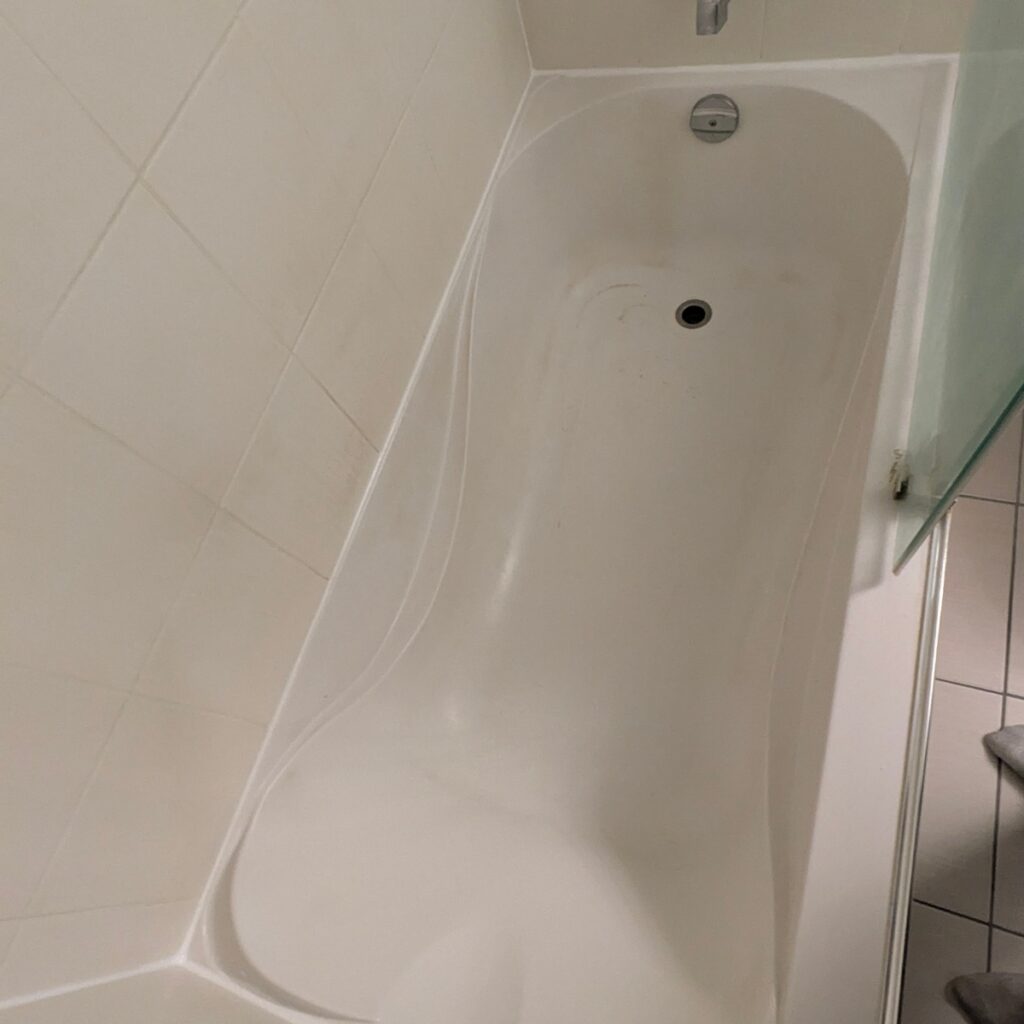 Shower Caulking Before and After Mississauga