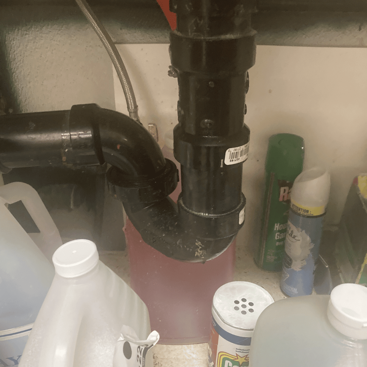 Clean and secure P-trap installation under sink