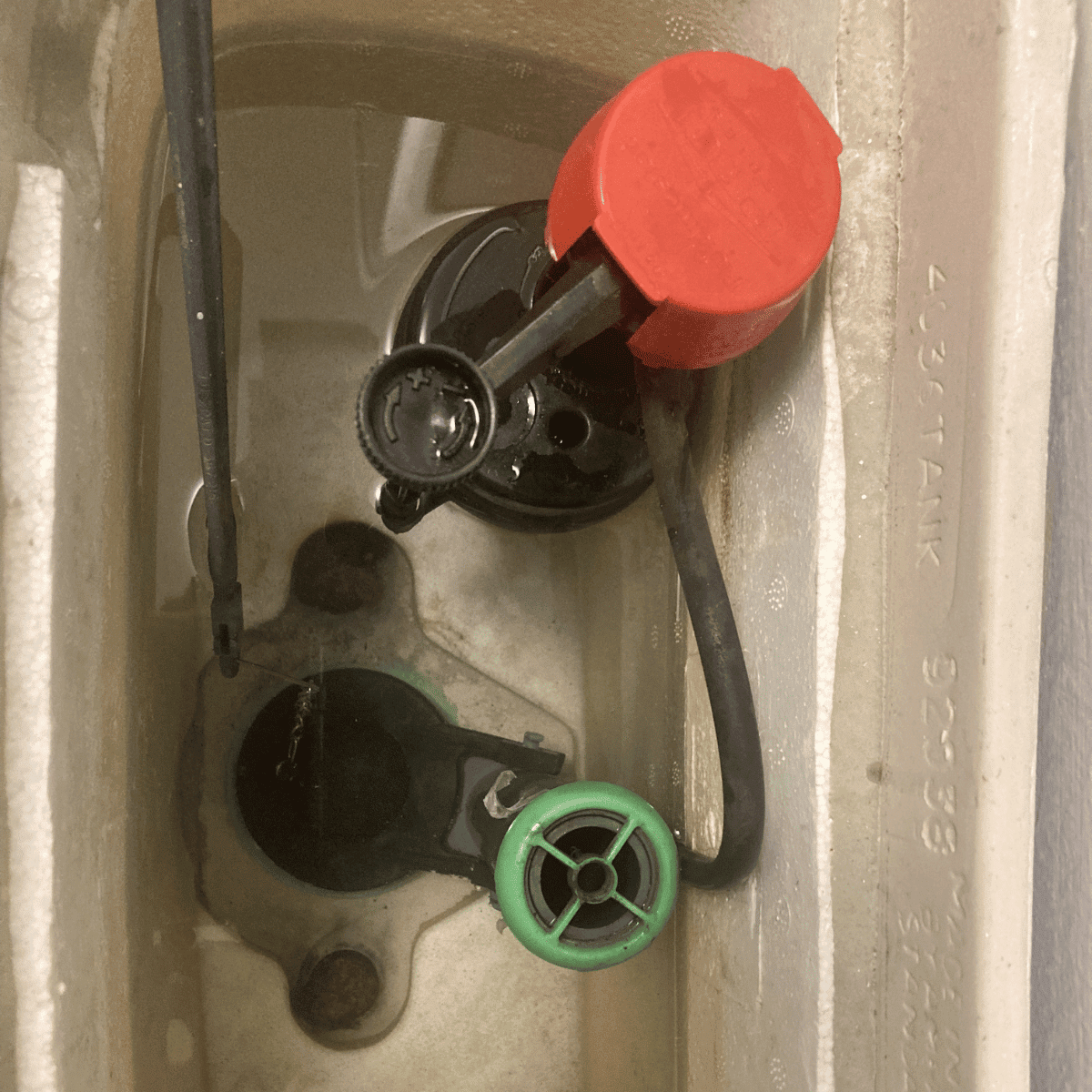 Installing new toilet flapper for proper seal