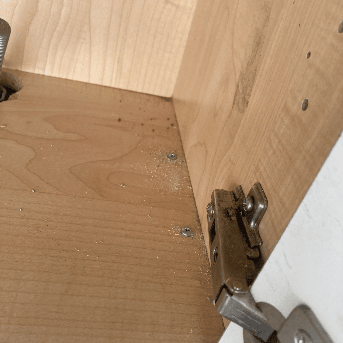 adjusting cabinet door hinge alignment screwdriver repair work