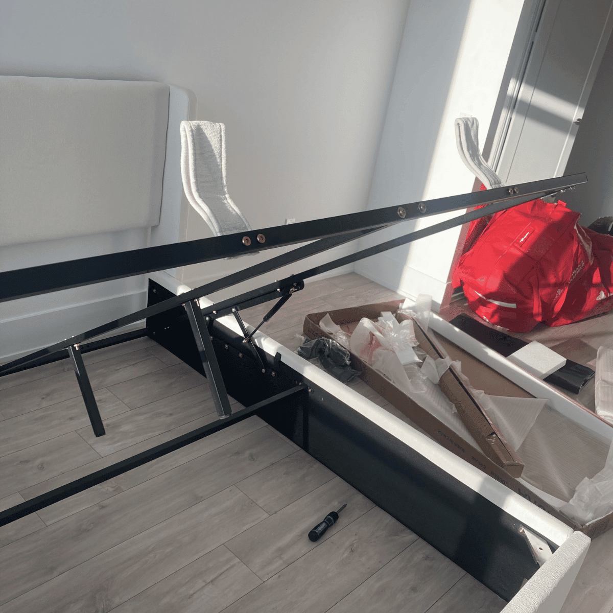 handyman assembling furniture using tools precise installation