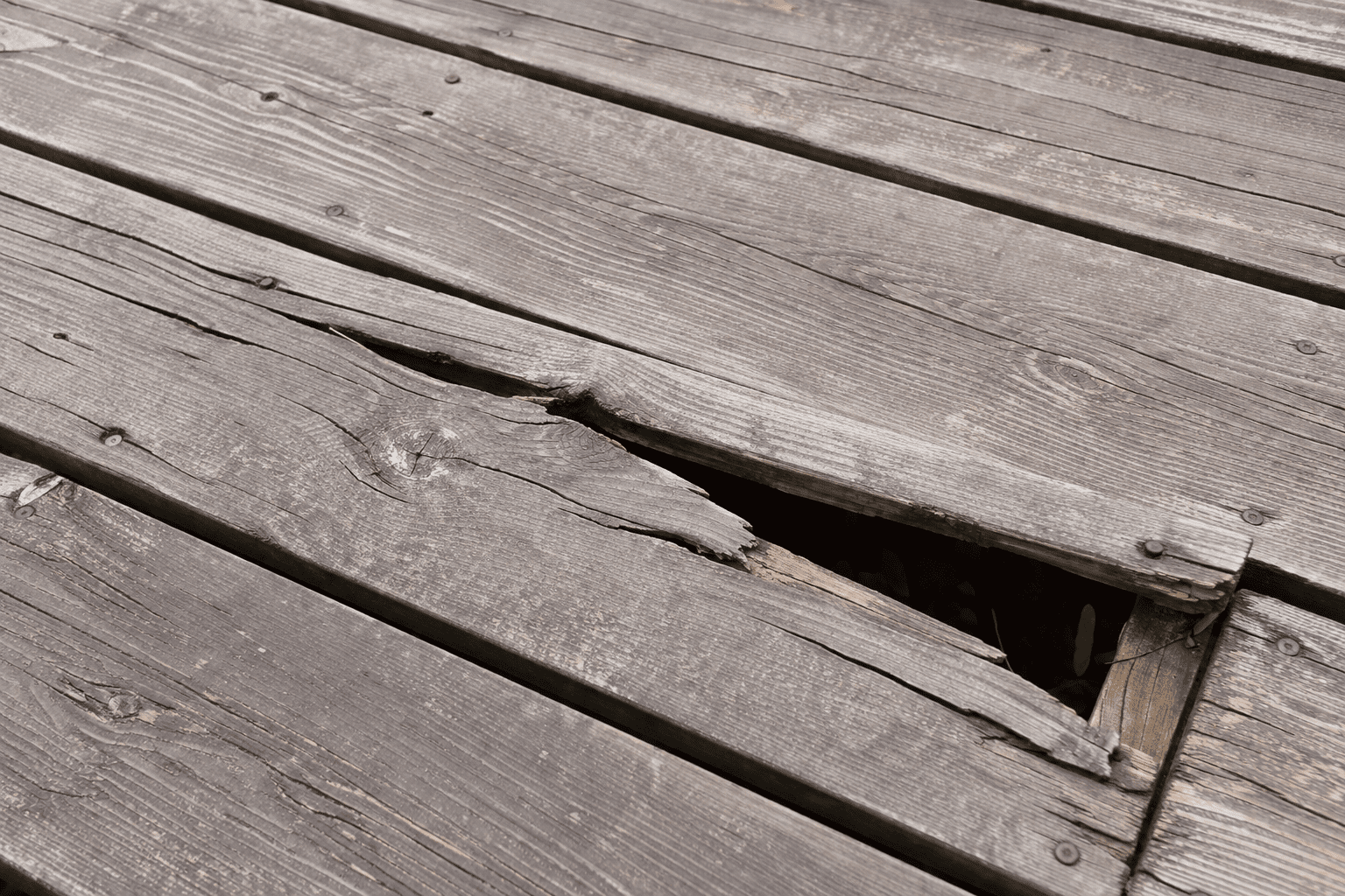 deck repair Toronto cracked loose wooden boards