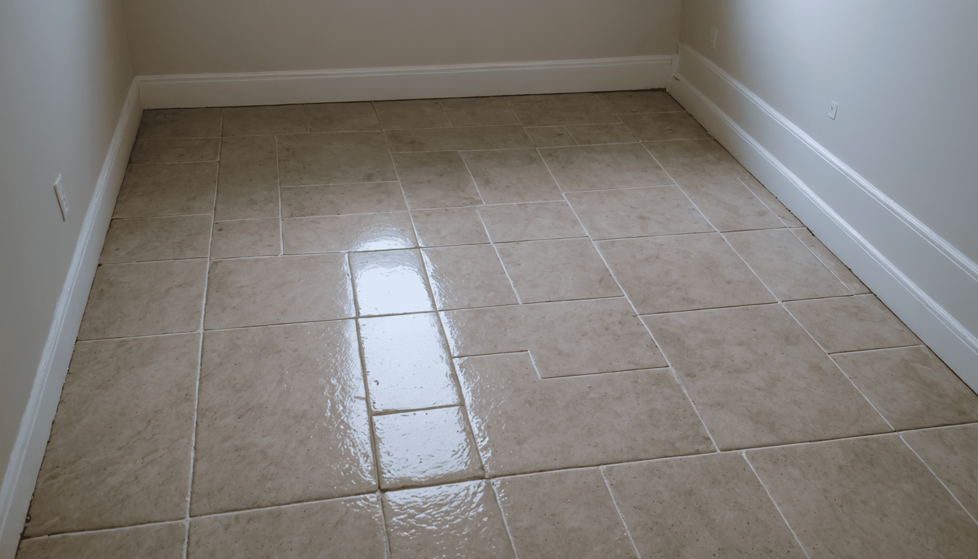 Sealed grout lines on bathroom floor Toronto GTA