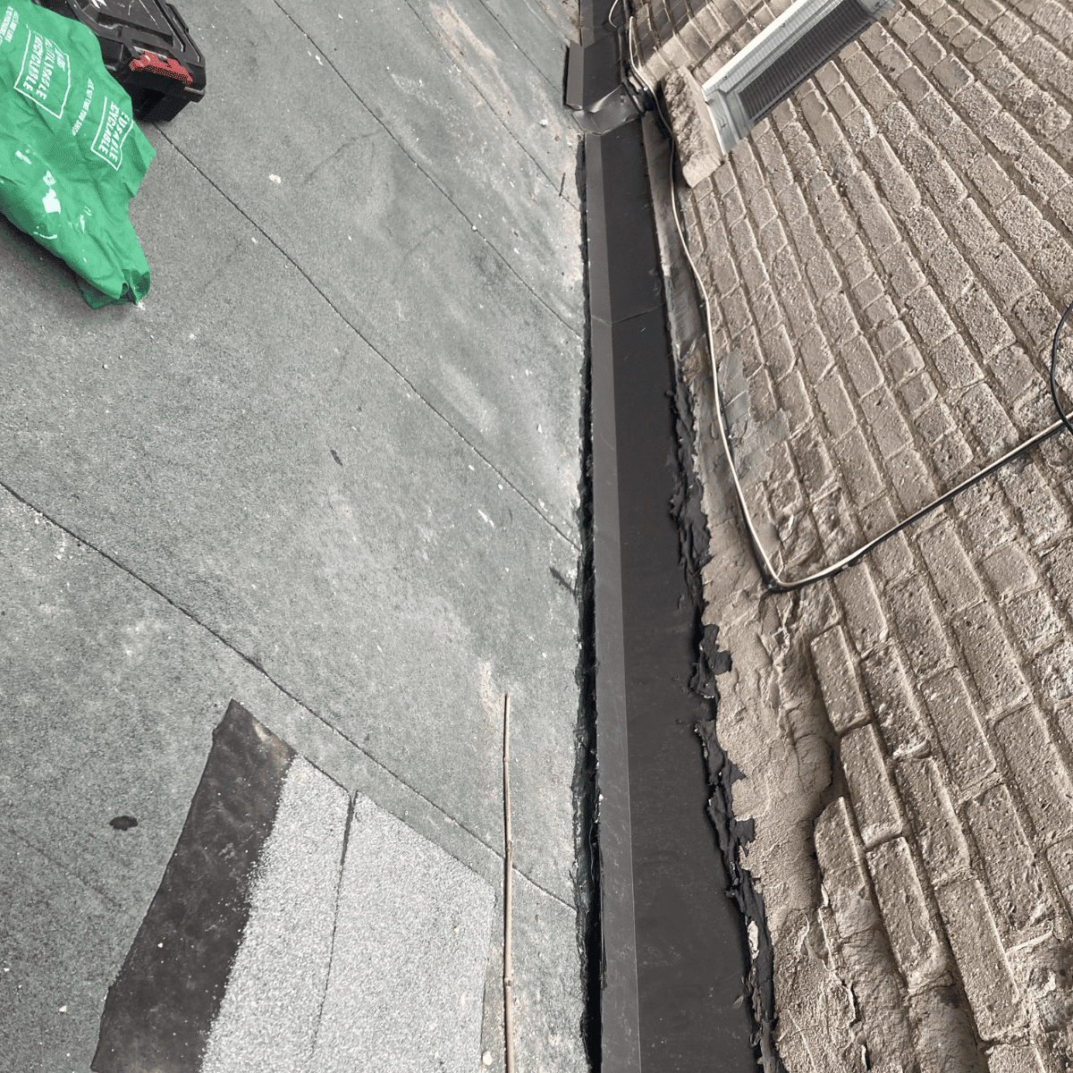 installing soffit panels under roof exterior repair work