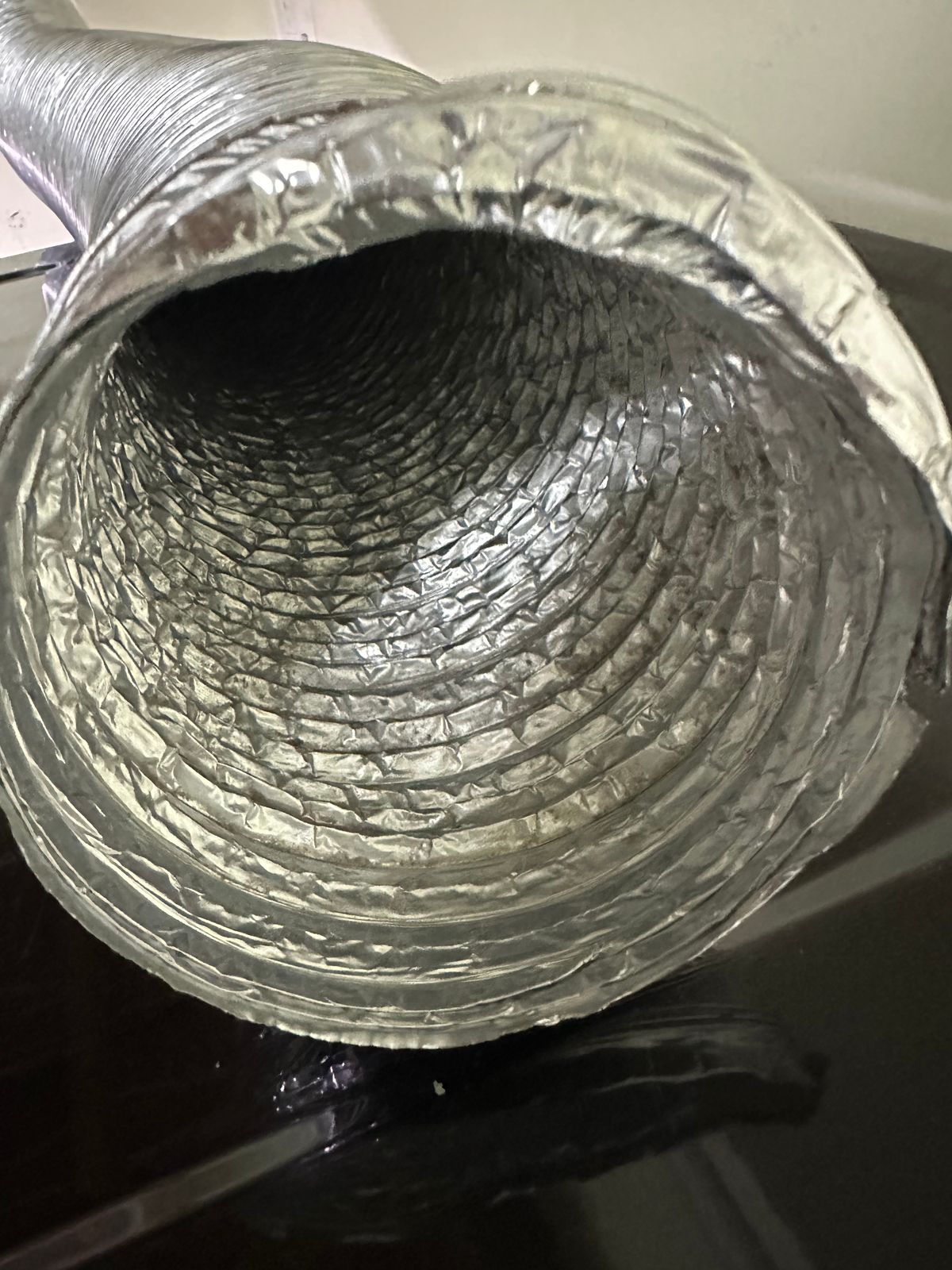 Bathroom fan cleaning in Toronto — cleaned exhaust duct interior