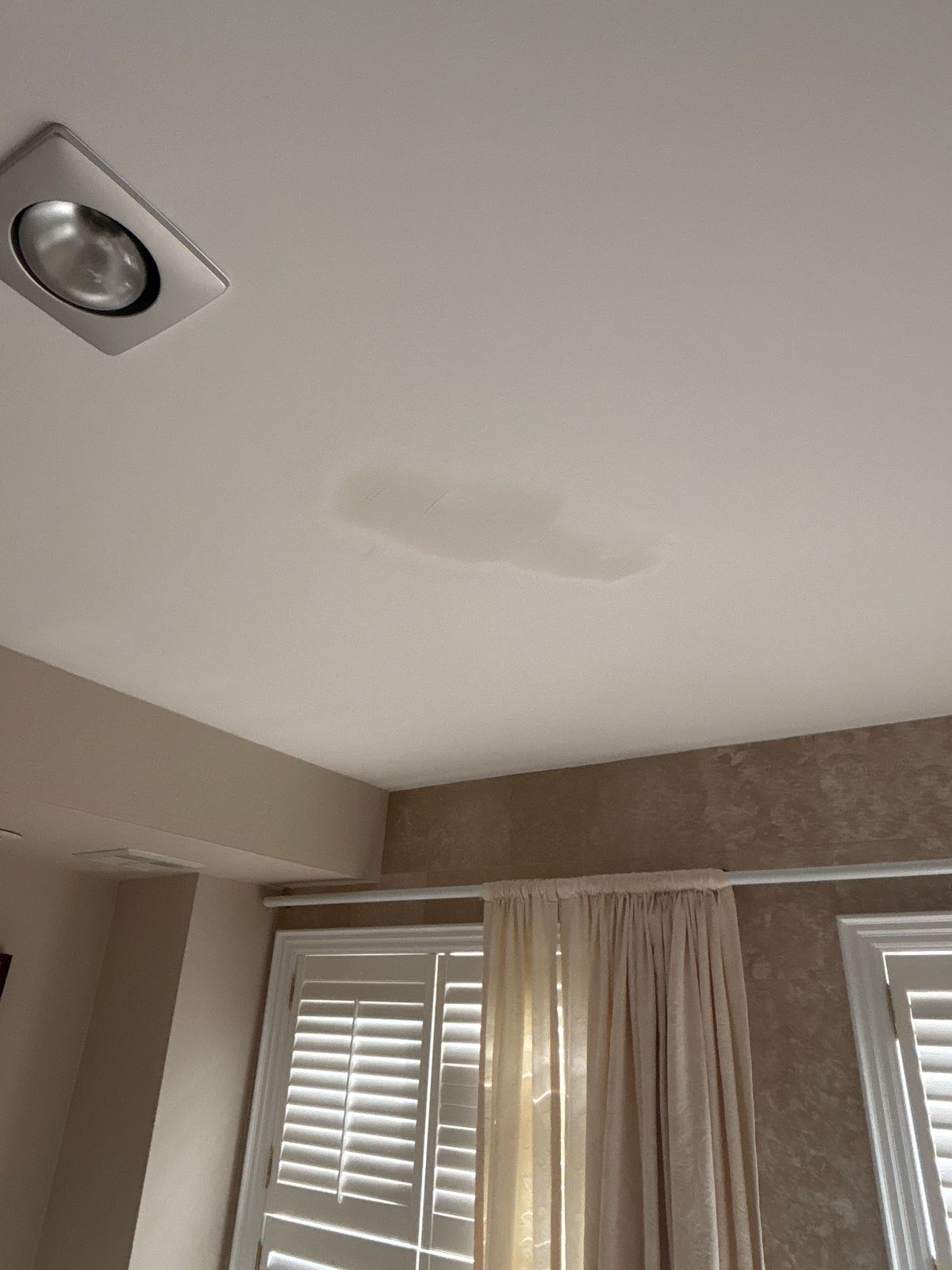 Ceiling painting in Toronto — water stain on ceiling before repair and repaint