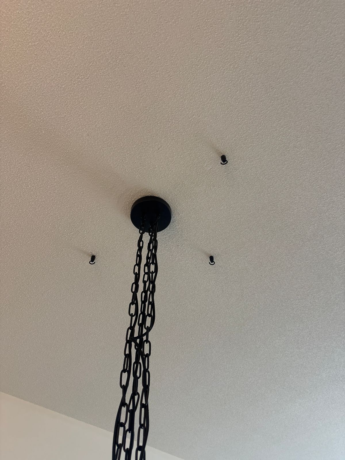 Concrete ceiling drilling in Vaughan — drilled ceiling anchors for light fixture installation by RenoHeal