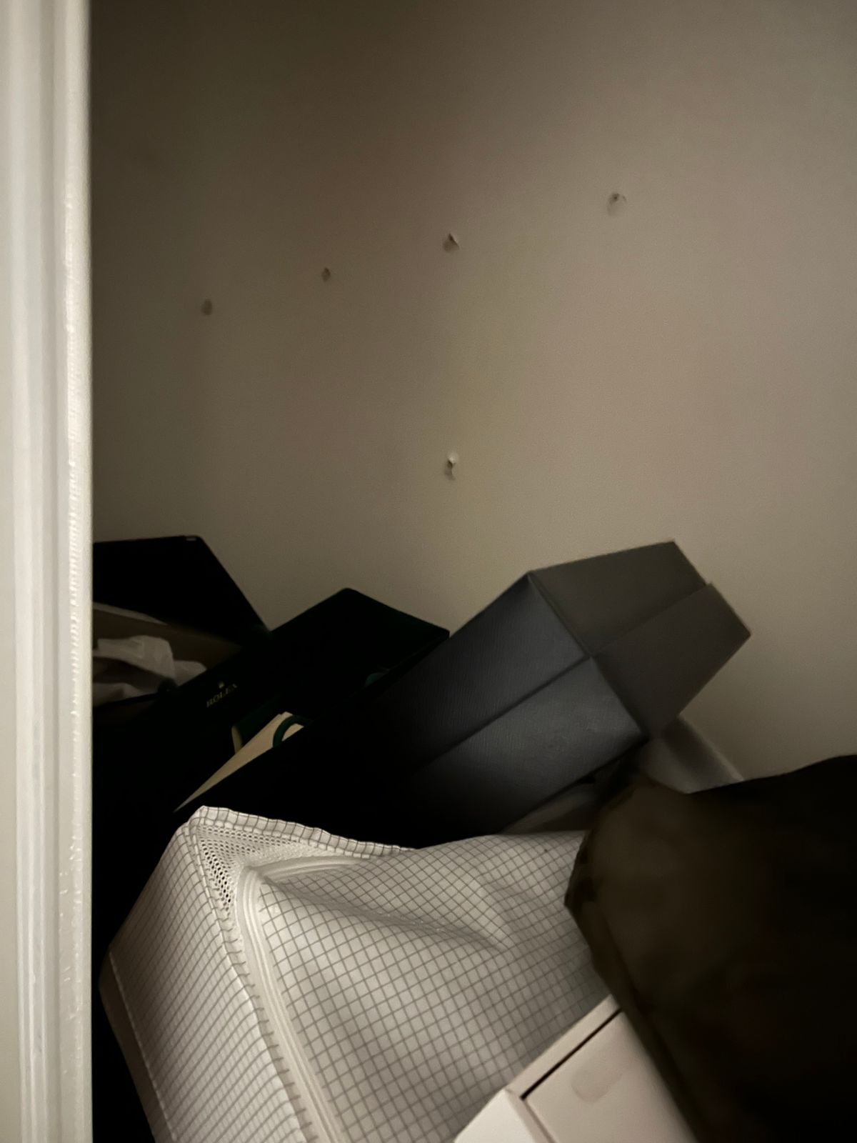 Wire closet shelf installation in Vaughan — wall marked for bracket placement
