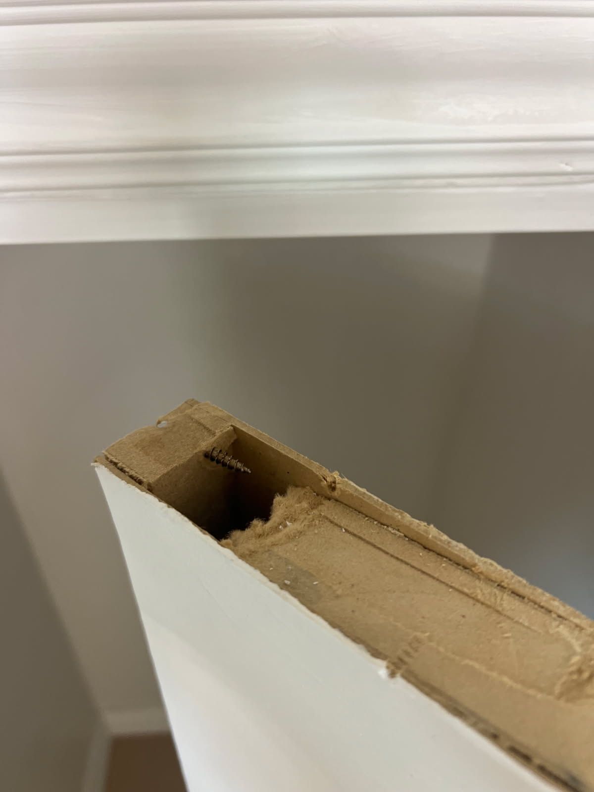 Closet door repair Markham – bifold closet door top edge with loose pivot hardware