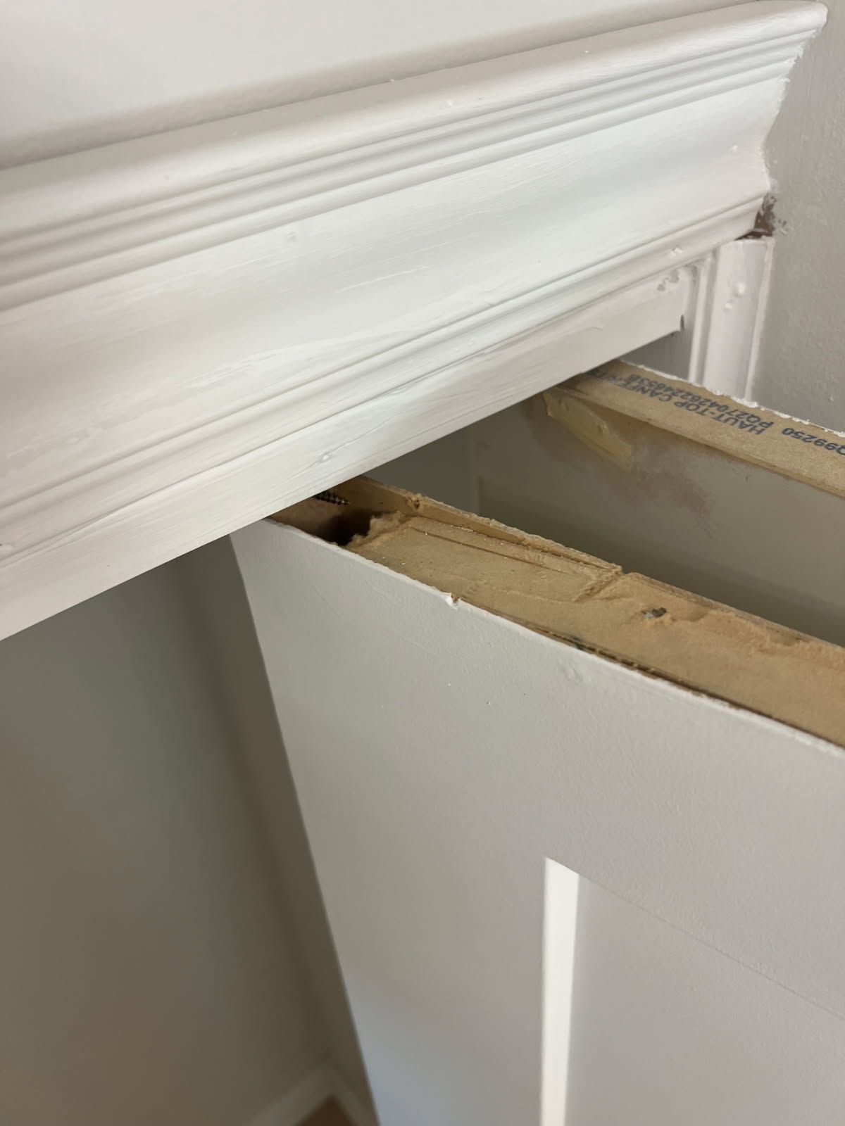 Closet door repair Markham – closet door aligned under the top track after repair