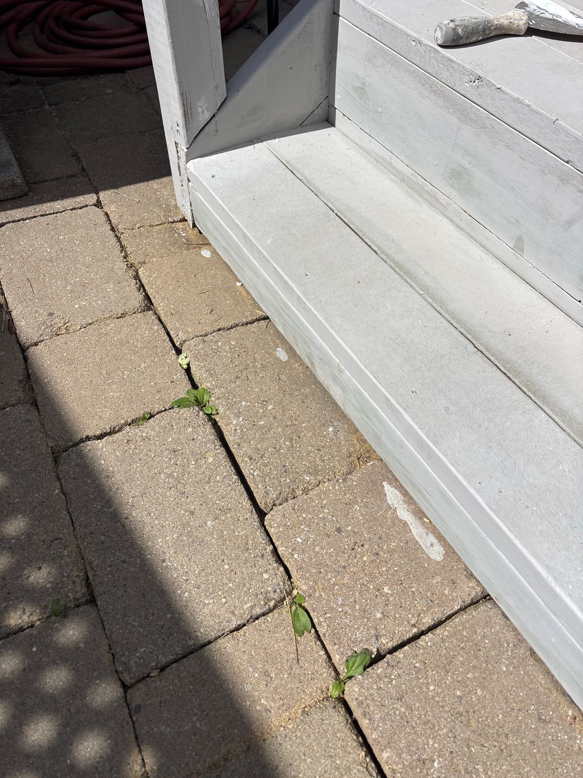 Deck repainting cost Richmond Hill – new painted fascia board along the deck edge