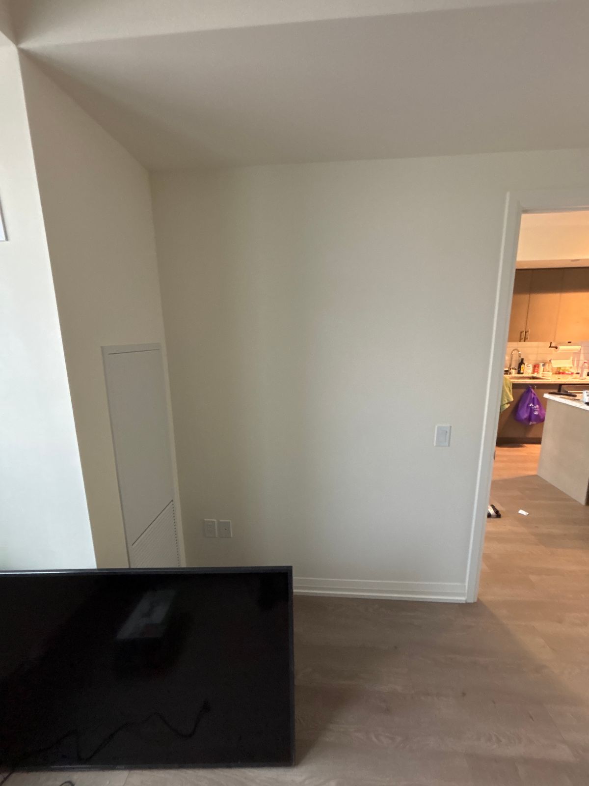 Full motion TV mount installation Vaughan – empty feature wall and TV before mounting