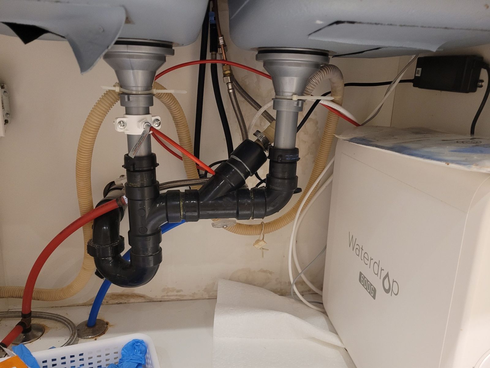 Kitchen sink drain repair Thornhill – P-trap and drain pipes under the kitchen sink