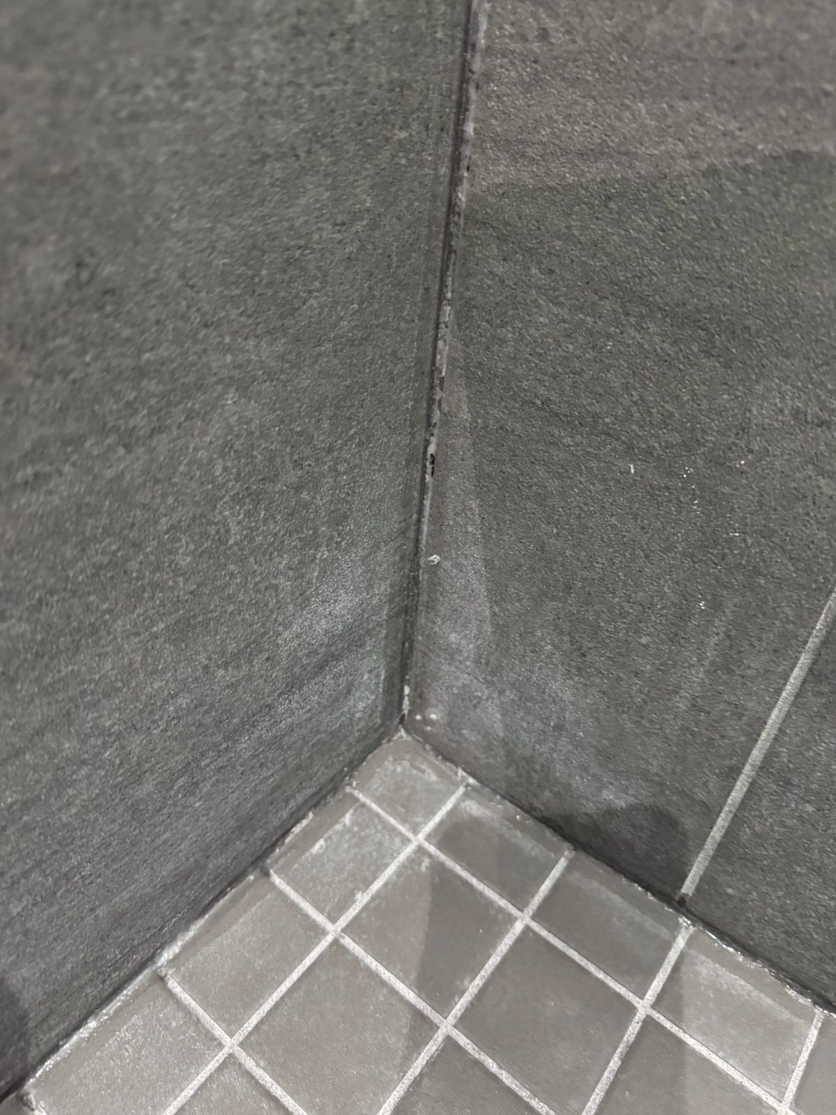 Shower caulking Mississauga – inside tile corner sealed with mould-resistant silicone